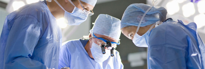 doctors performing surgery in operating room